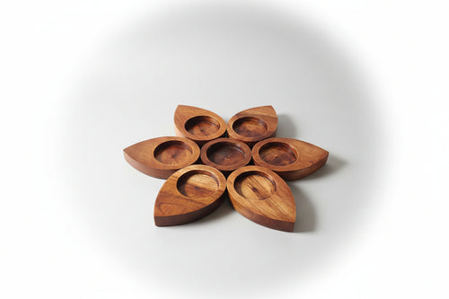 Elegant handcrafted pear tea light holder adding warmth to modern home decor