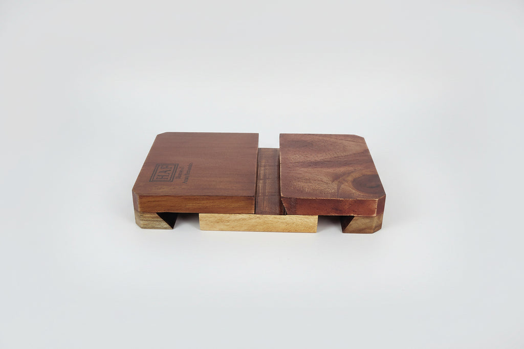 Handcrafted wooden 3-way mobile stand for phone viewing in multiple angles.