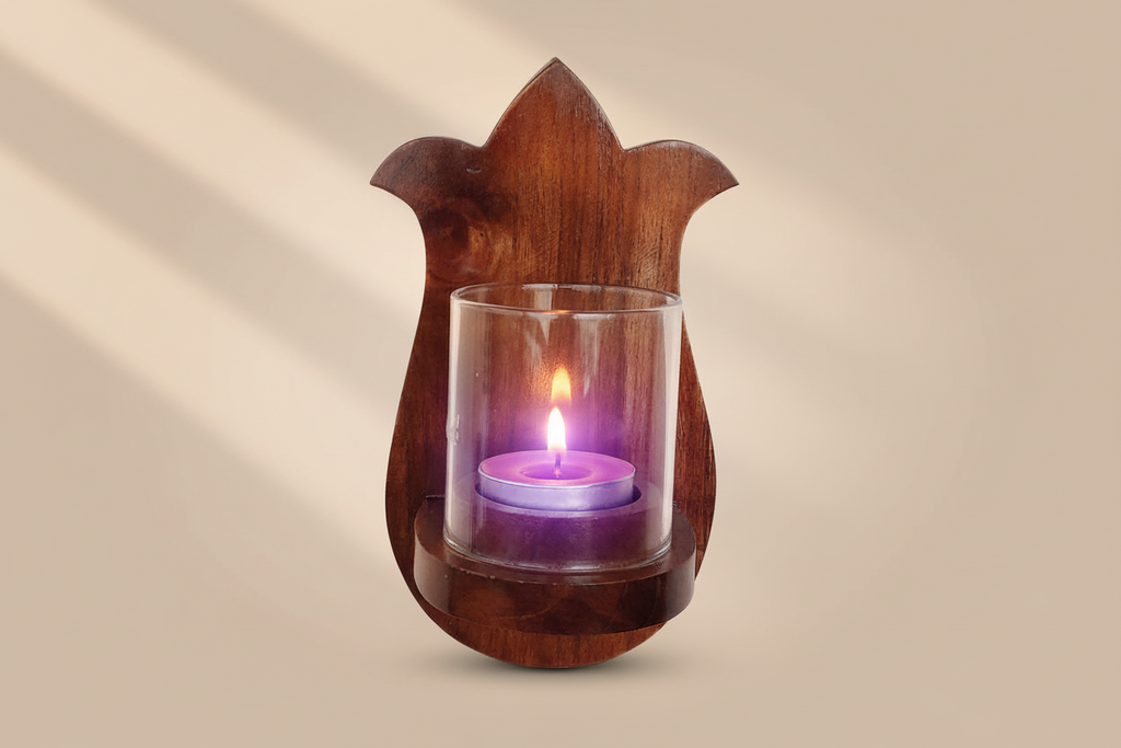 Handcrafted wooden paisley wall tea light holder for decorative wall lighting.