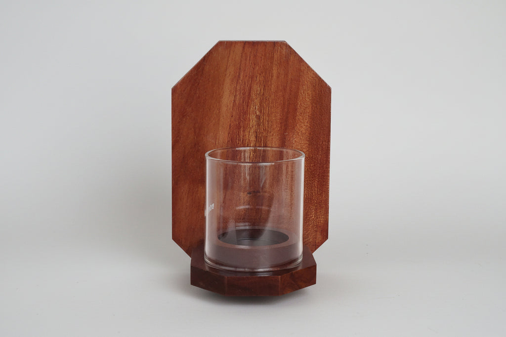 Handcrafted octagon wall-mounted wooden tea light candle holder for home décor.