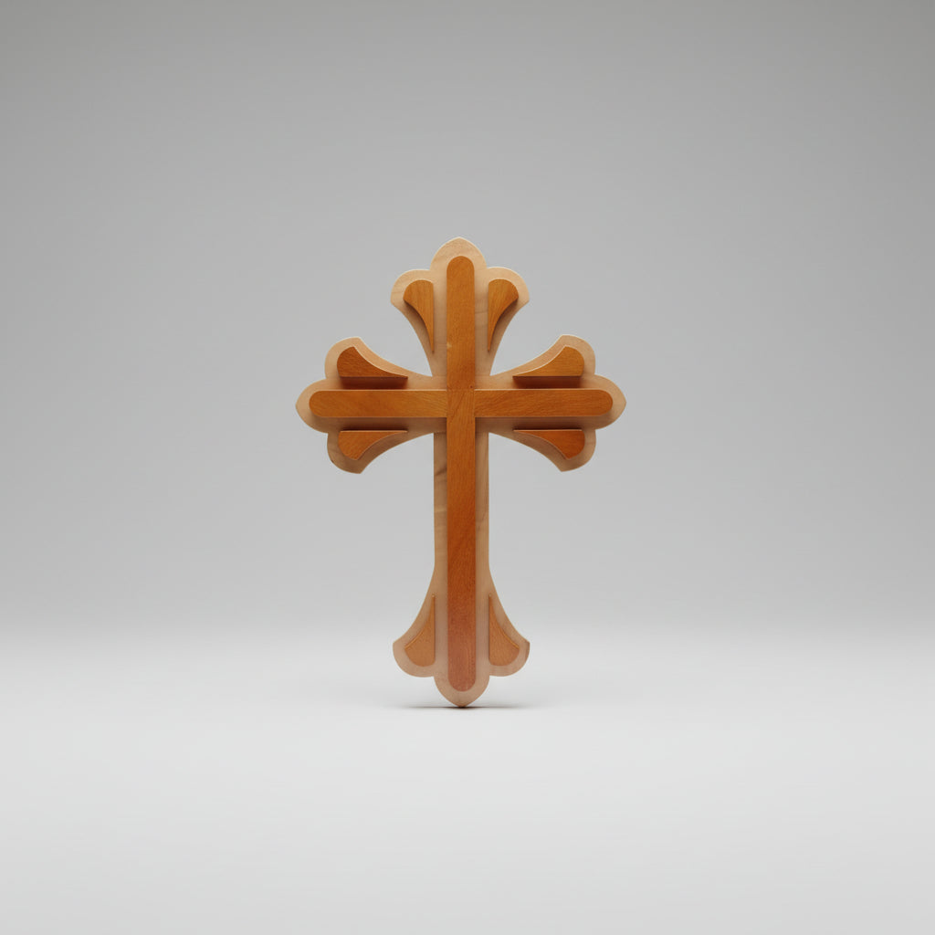 A decorative wooden cross with a warm brown center and light beige carved borders, shown against a plain beige background.