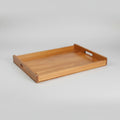 Wooden tray on a light-colored surface