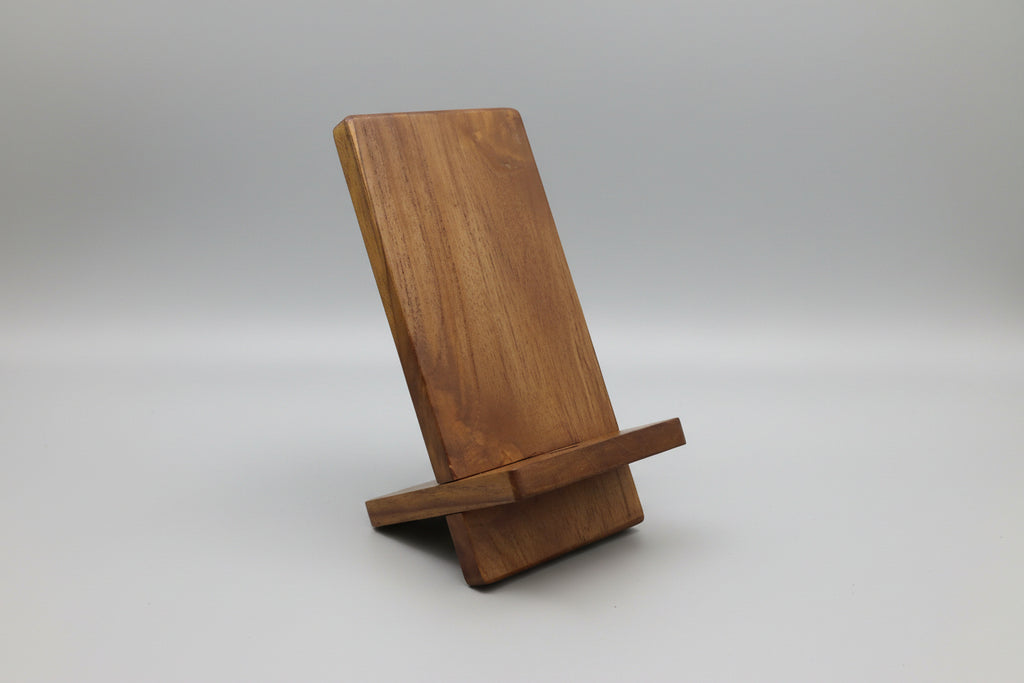 Wooden phone stand on a Gray Background